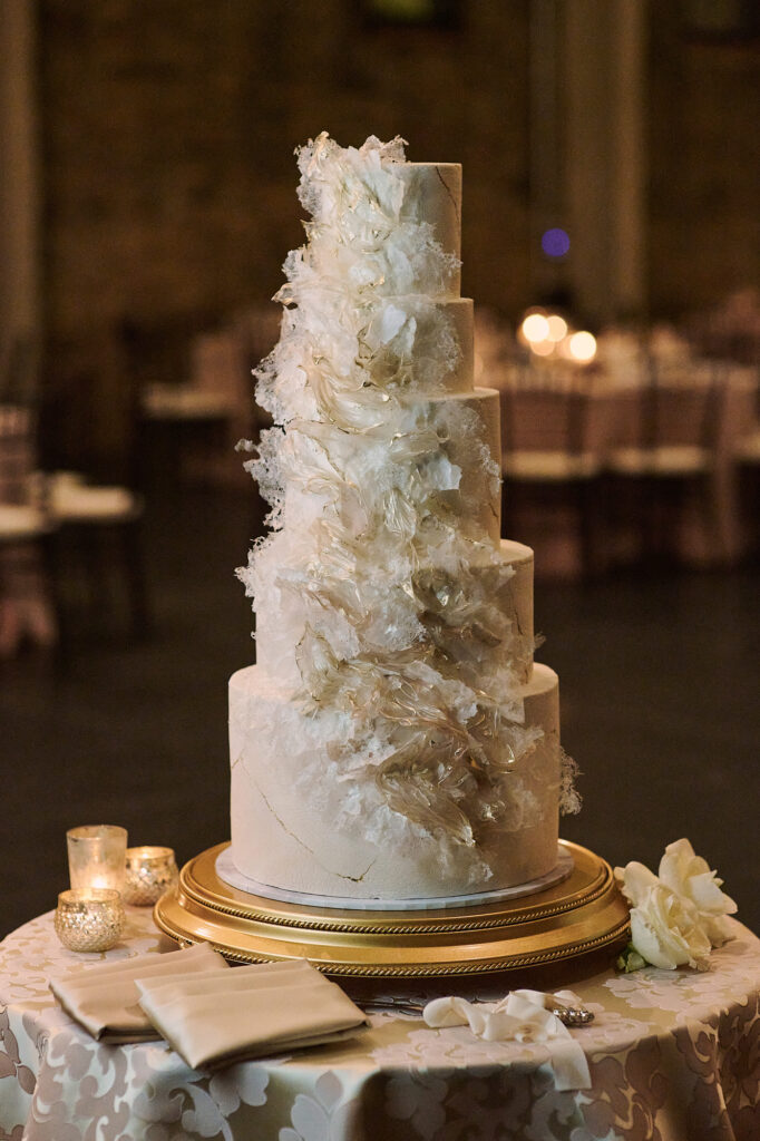 floral inspired ivory and gold wedding cake 