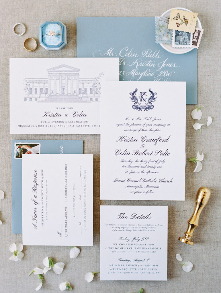 dusty blue and white wedding invitation suite as a wedding trend for 2023